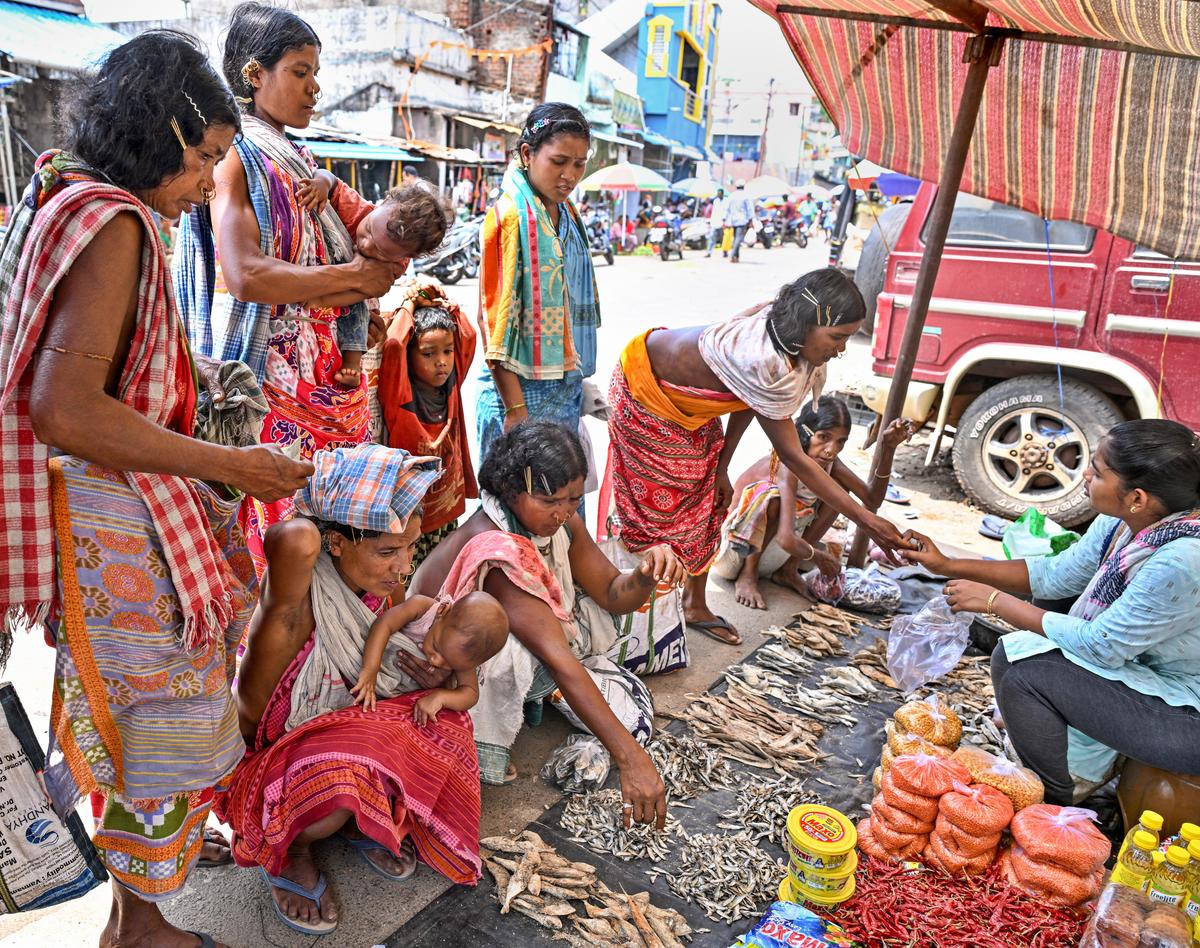 Women from Dongria Kondh tribe buying dried fish at the Monday shandy at Kalyan Singpur, a small town at the foothills of Odisha’s Niyamgiri range. Photo: K R Deepak