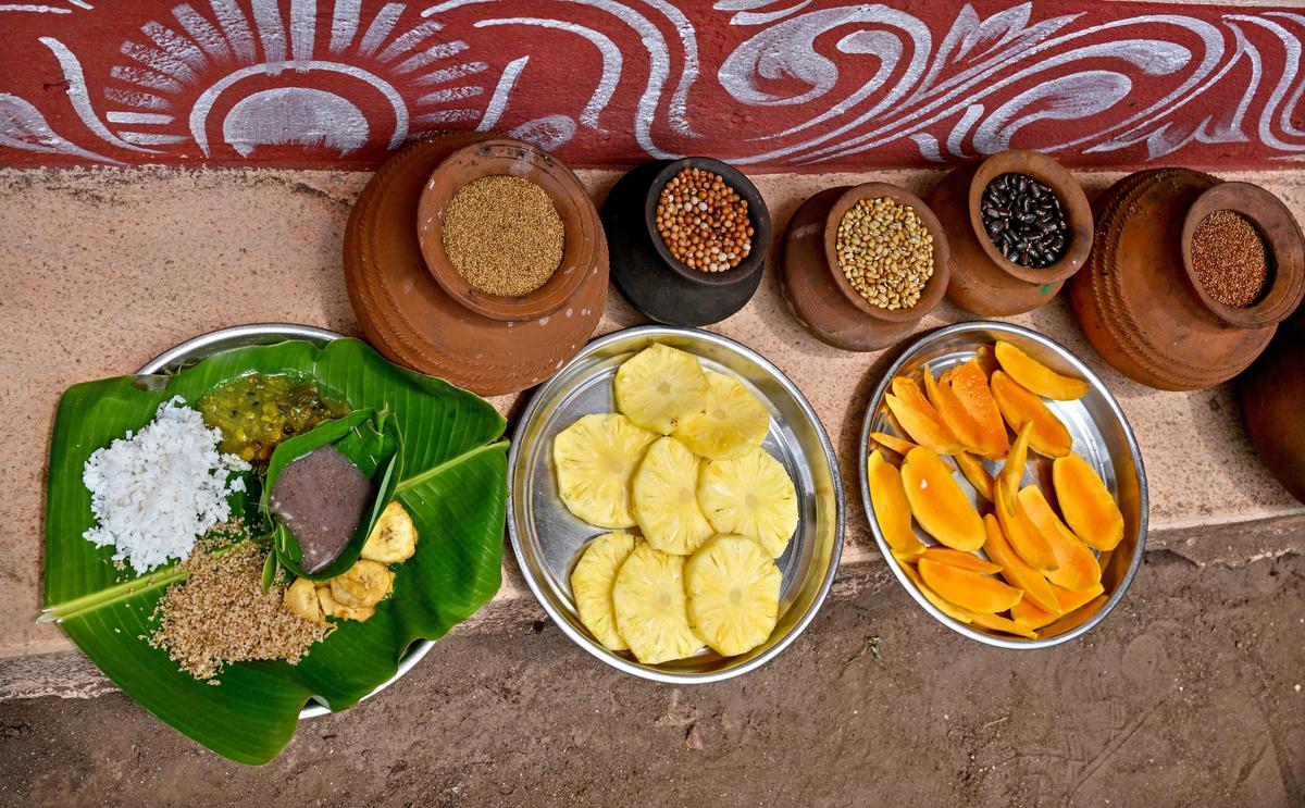 A meal of native dal varieties and plantain fry served on leaf plate fashioned from stitched leaves at Phakeri village in Niyamgiri, Odisha.