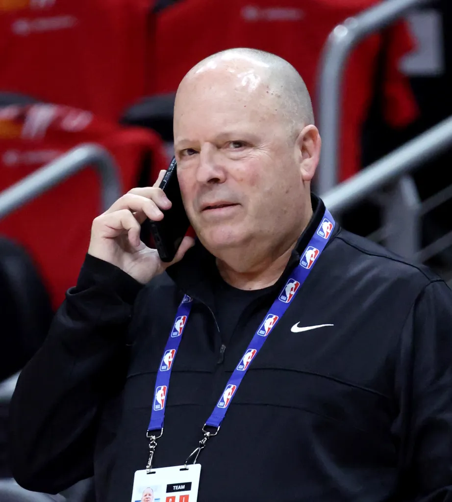 Knicks president Leon Rose talks on the phone during the Knicks-Hawks Game 3.