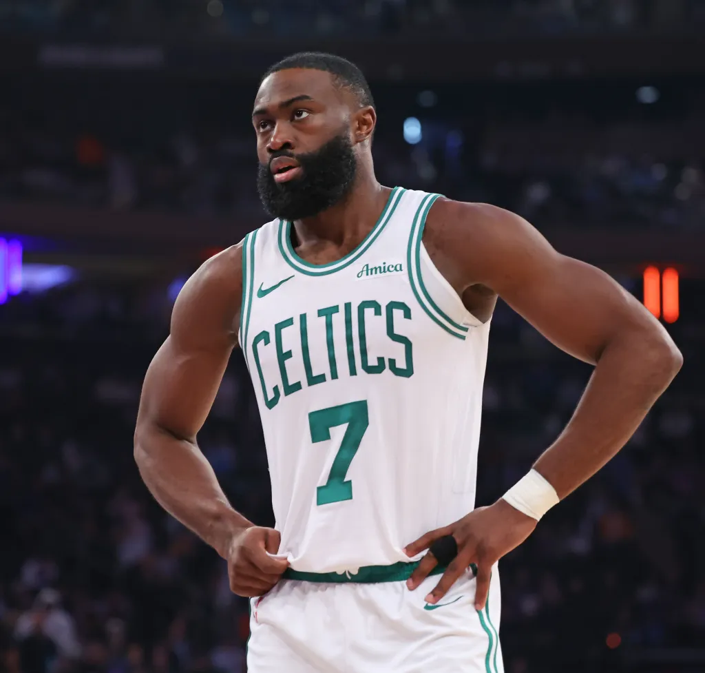 Jaylen Brown looking out on the basketball court during an NBA game.