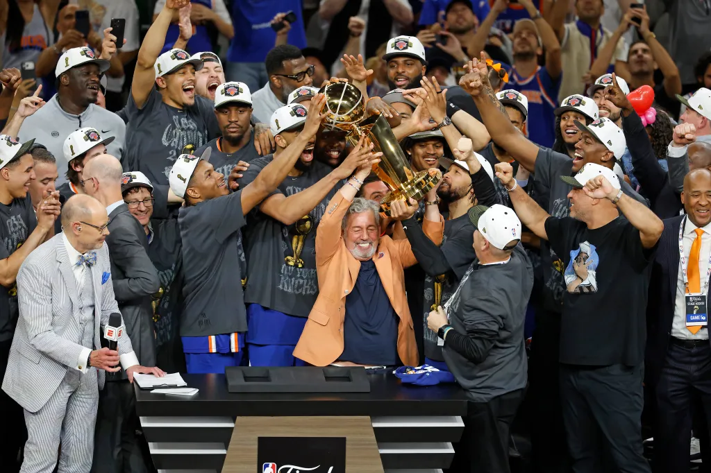James Dolan holds the Larry O'Brien as the Knicks won the NBA Finals.