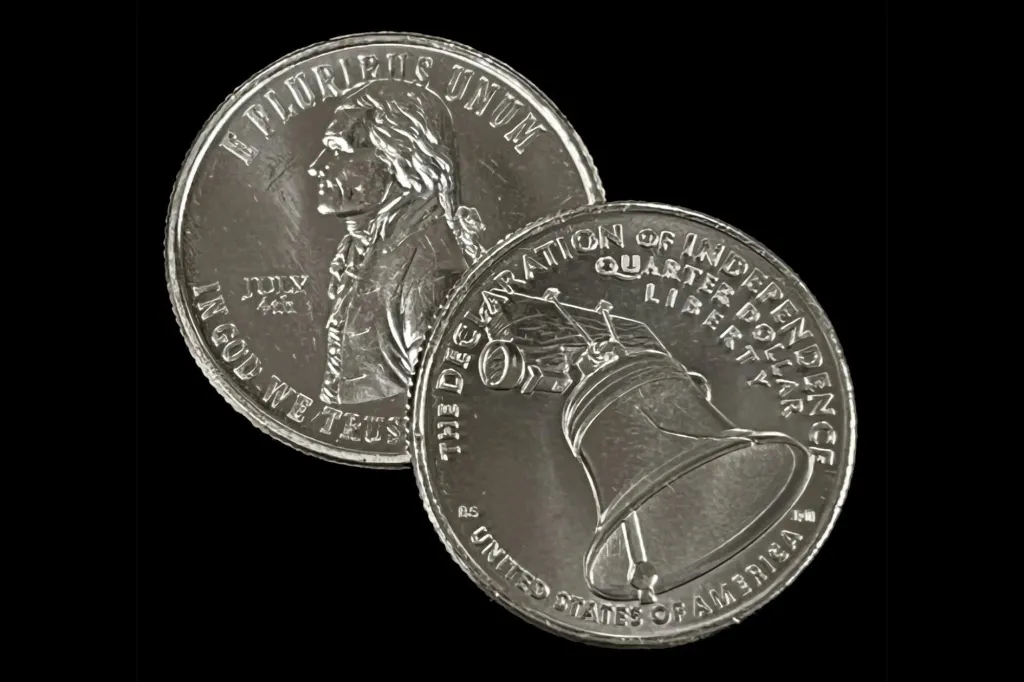 A bicentennial quarter and a Jefferson nickel.