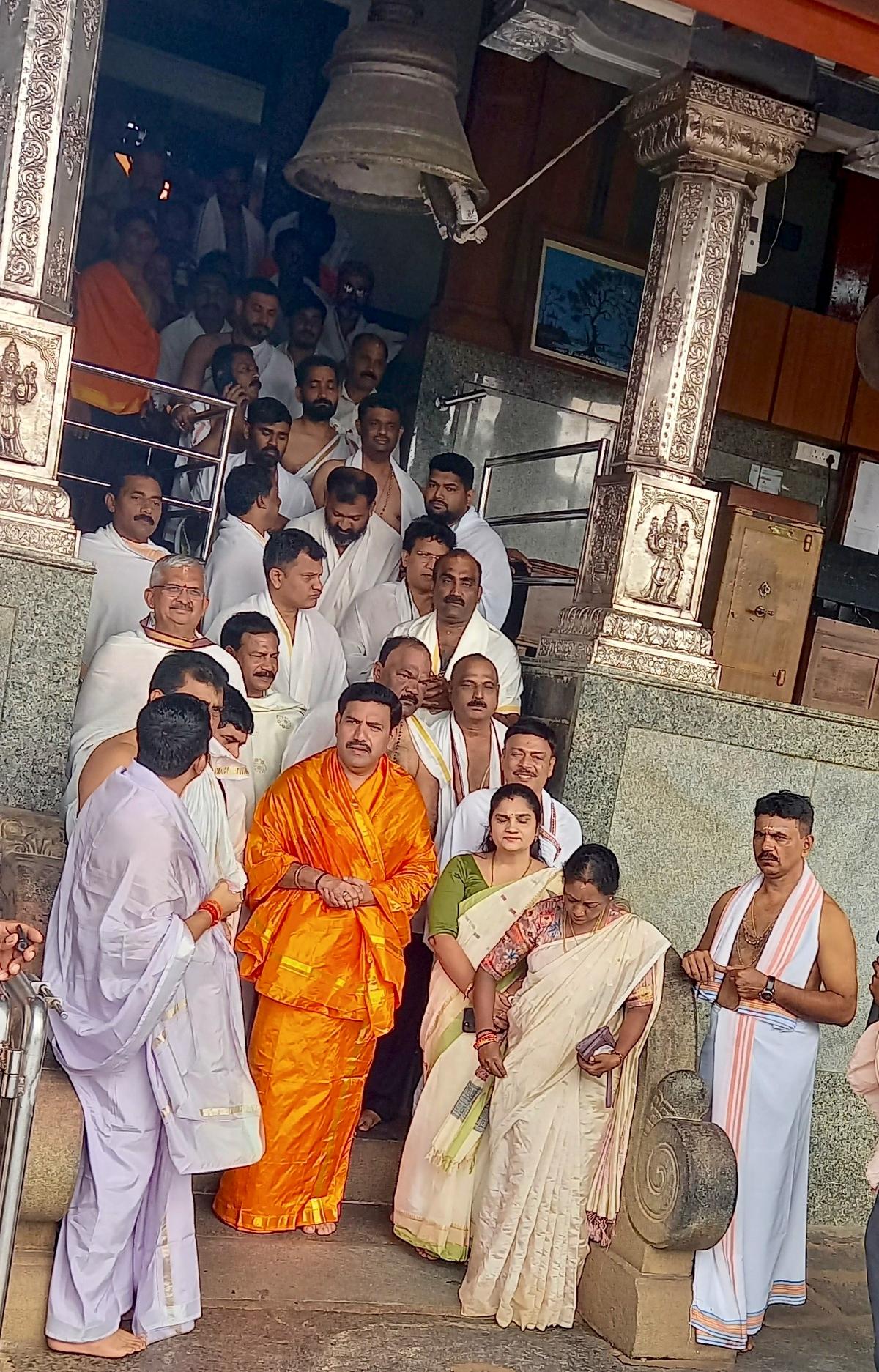 President of Karnataka unit of BJP B. Y. Vijayendra emerges from Sri Manjunathaswamy temple after a darshan, in Dharmasthala, Dakshina Kannada district, on June 26, 2026.