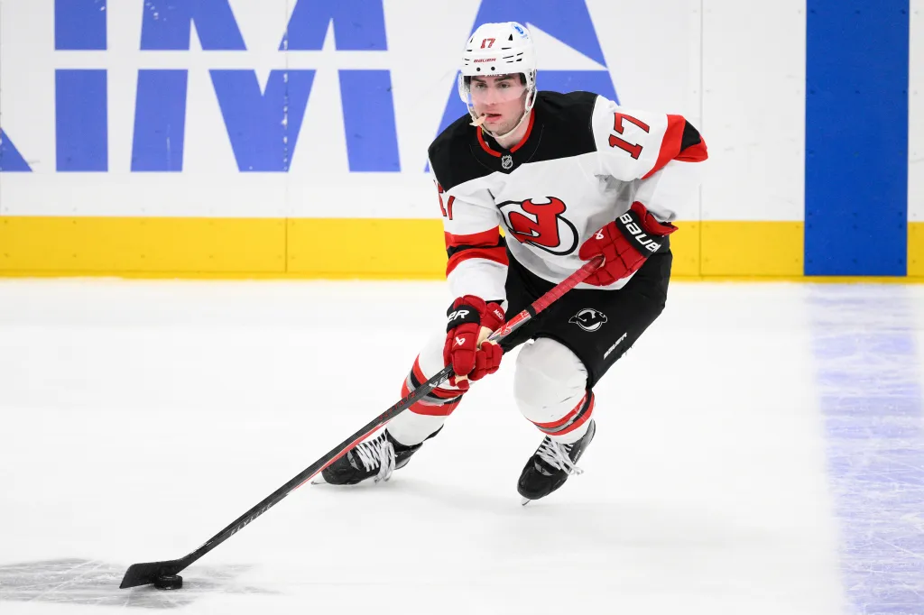 New Jersey Devils defenseman Simon Nemec (17) controls the puck during a game against the Washington Capitals.