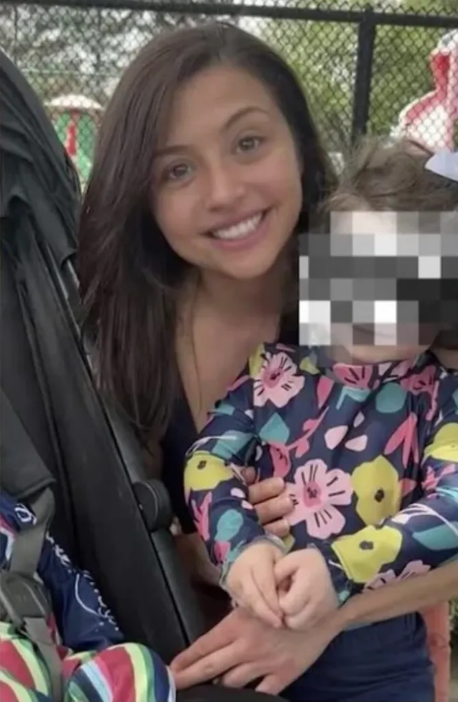 Olivia Bithorn smiling with 18-month-old Luke Russel Jr. in her arms