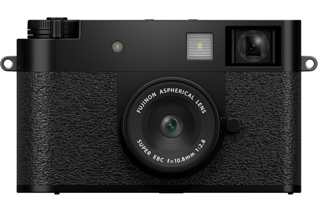 A Fujifilm X Half Camera, with a black textured grip, black body, and a black Fujinon Super EBC Aspherical Lens 1:2.8 10.8mm.