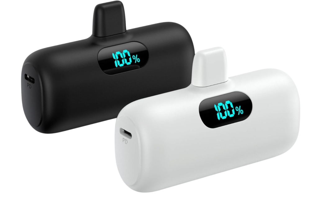 INIU portable chargers in black and white, both with a 100% charge display.