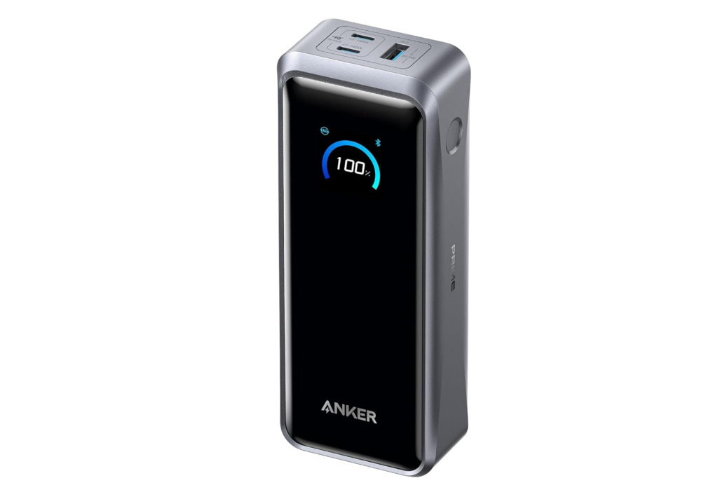 An Anker Prime 27,650mAh Power Bank (250W) with 100% charge displayed on its screen.