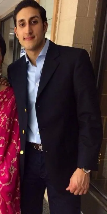 Chirayu Rana in a navy blazer and light blue shirt.