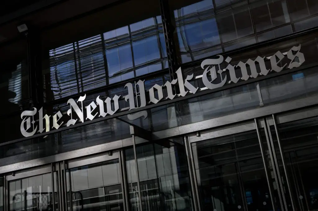 The New York Times building with the newspaper's logo.