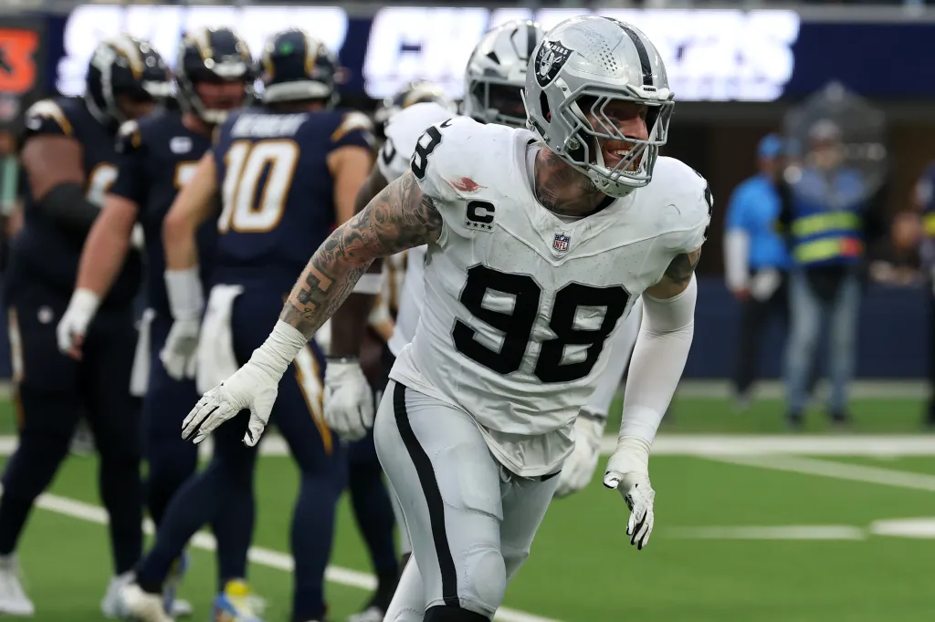 NFL player Maxx Crosby of the Las Vegas Raiders wearing jersey number 98 on the field.