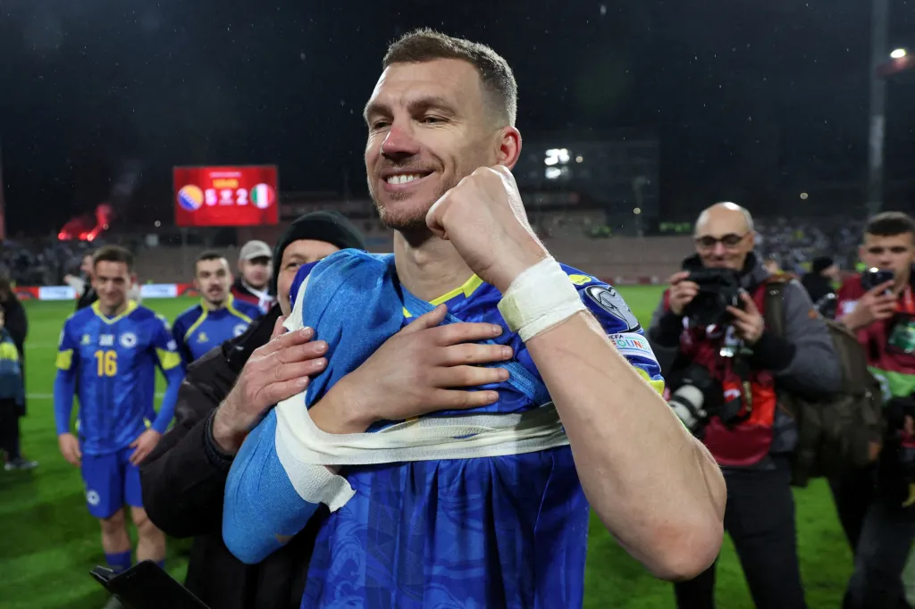 Bosnia and Herzegovina's Edin Dzeko celebrates qualifying for the FIFA World Cup.