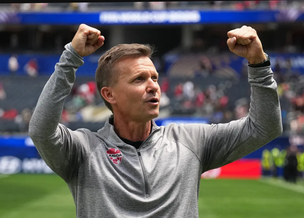 Canada coach Jesse Marsch celebrating after the match.