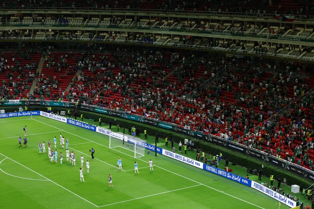 Czech Republic players applauding fans in a stadium after a FIFA World Cup 2026 match.