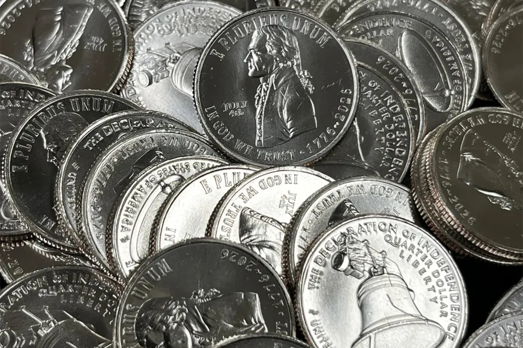 A pile of 2026 Declaration of Independence Quarters with a "July 4th" privy mark.