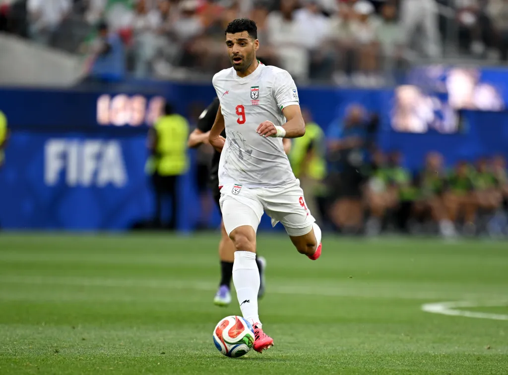 Mehdi Taremi of Iran dribbles the ball during a FIFA World Cup 2026 match against New Zealand.