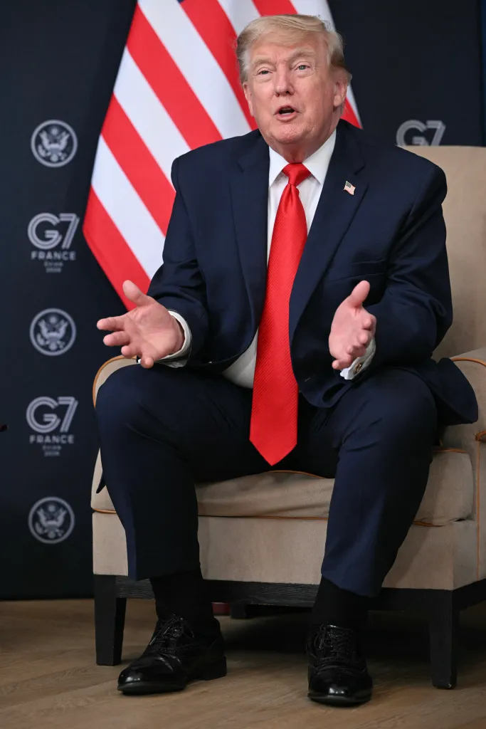 Donald Trump delivering remarks at the G7 summit.
