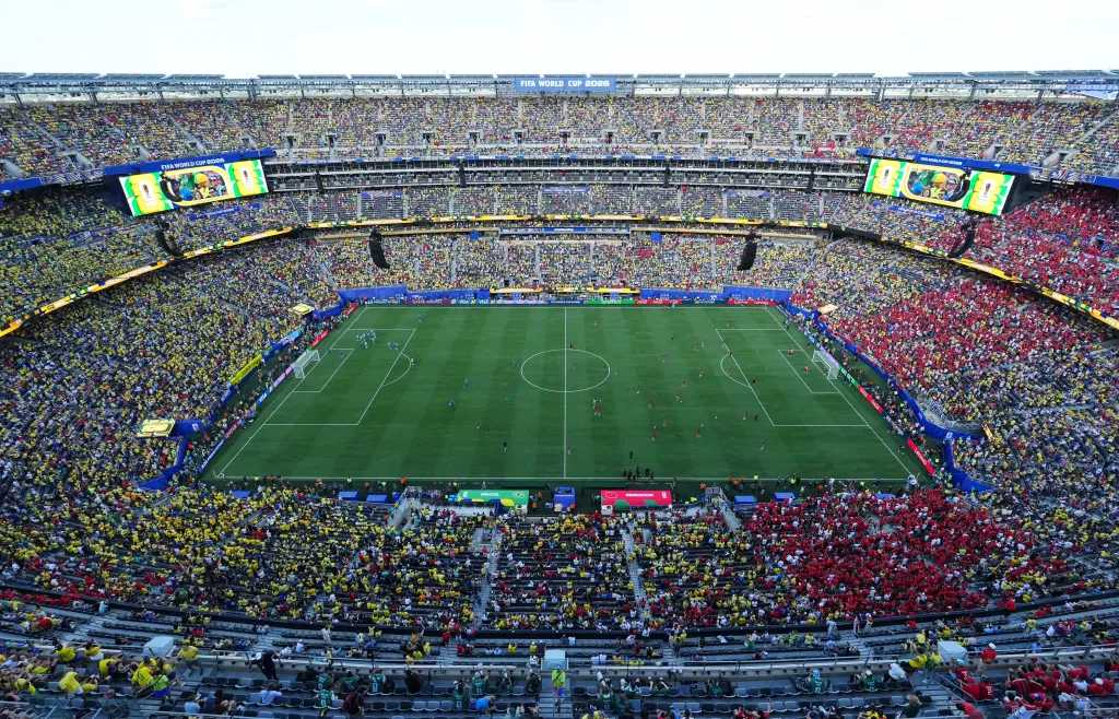 Overview of the New York/New Jersey Stadium with spectators filling the stands for the FIFA World Cup 2026 match between Brazil and Morocco.