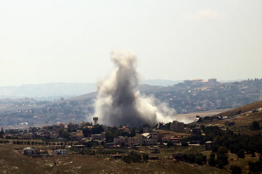 Smoke rising from a village after an Israeli airstrike.