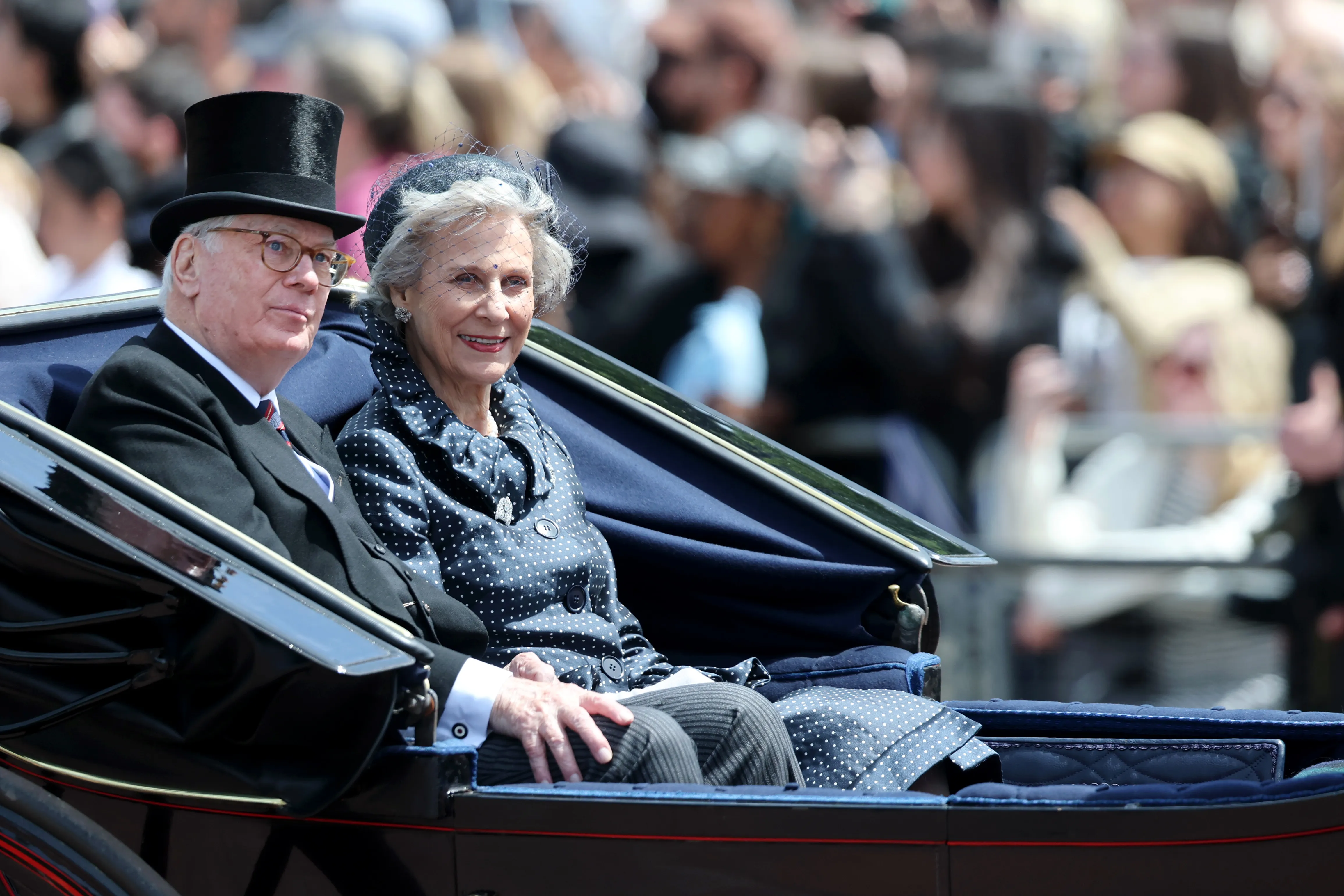 Prince Richard, Duke of Gloucester and Birgitte, Duchess of Gloucester pass through the Trooping The Colour parade.