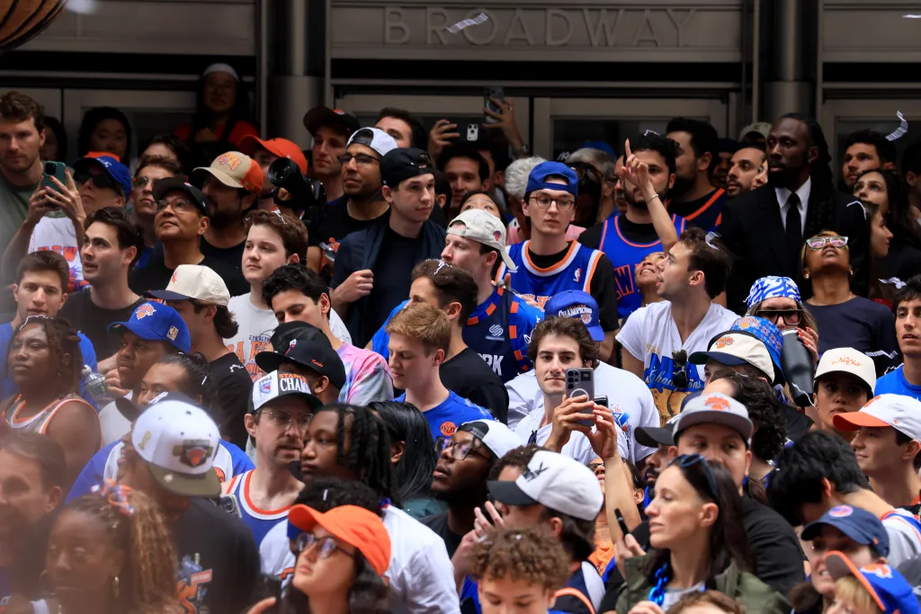 Fans cheer at the New York Knicks Championship ticker tape parade.