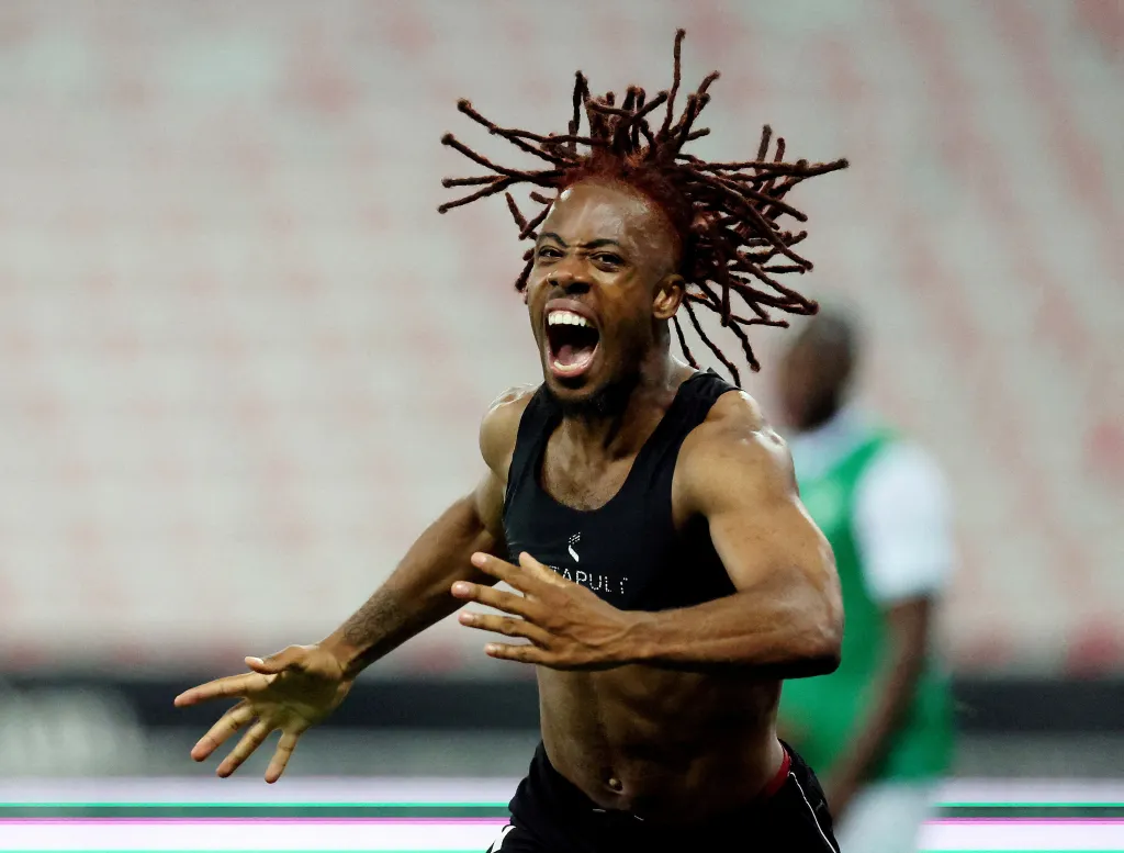 OGC Nice's Elye Wahi celebrates scoring their third goal.