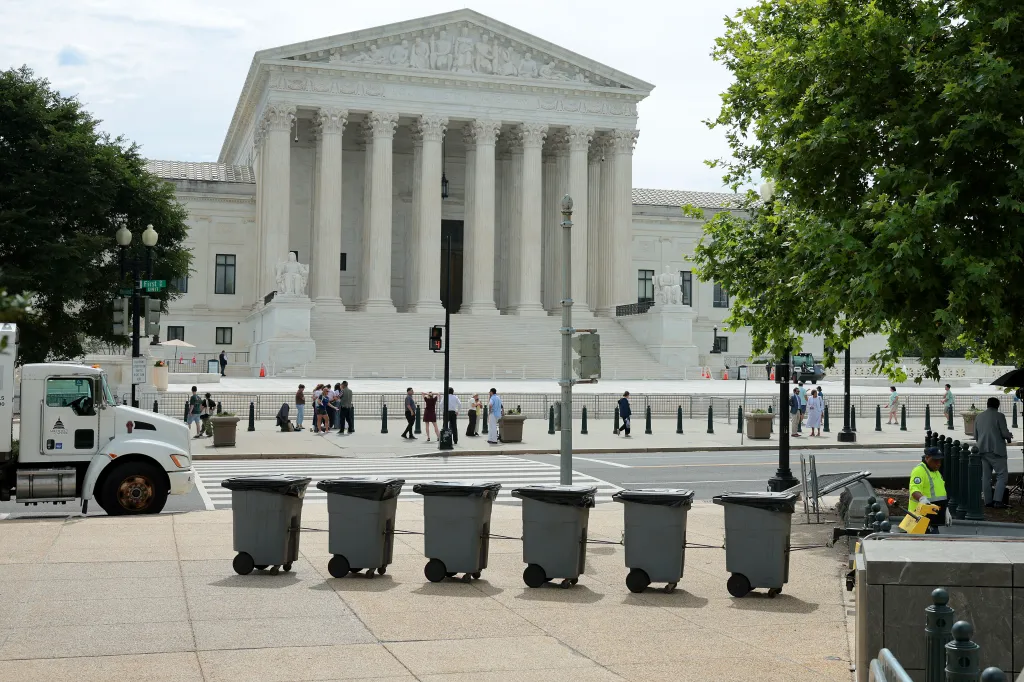Trash cans lined up across the street from the US Supreme Court building.