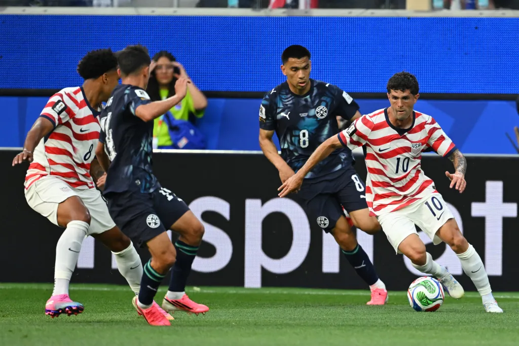 US forward Christian Pulisic with the ball during the 2026 World Cup Group D match against Paraguay.