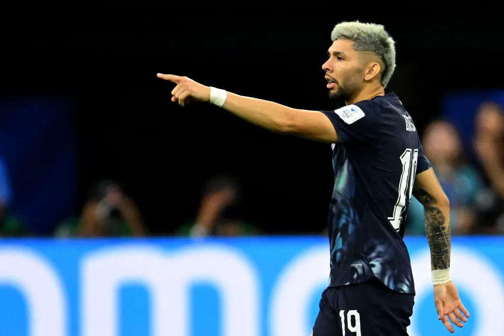Paraguay's midfielder Julio Enciso gesturing during a football match.