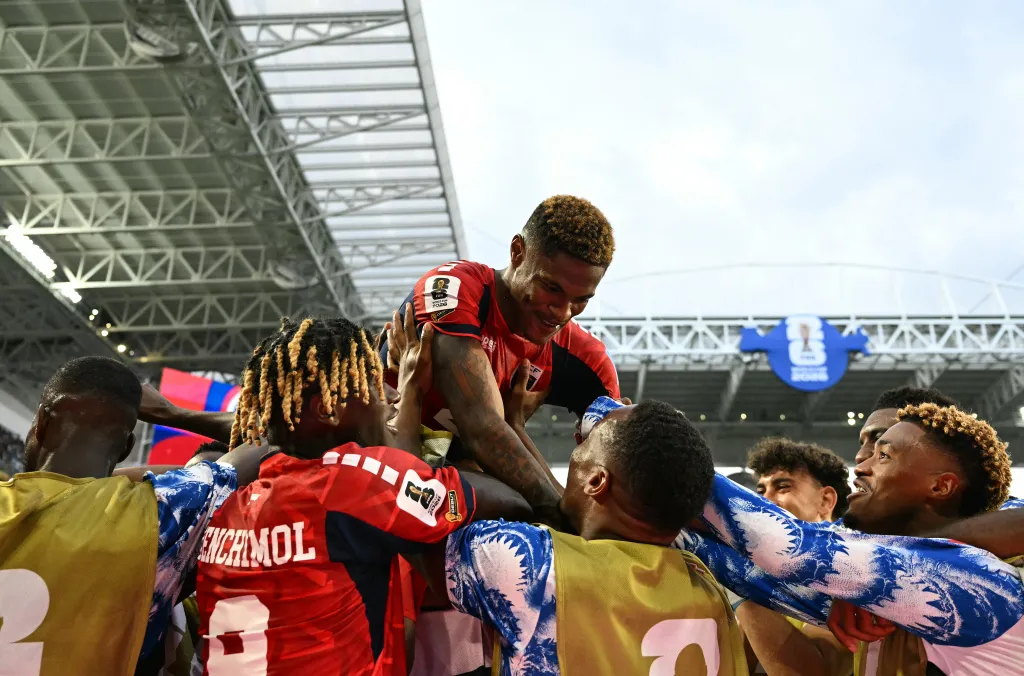 Cape Verde's Helio Varela celebrates a goal with teammates during the 2026 World Cup Group H football match against Uruguay.