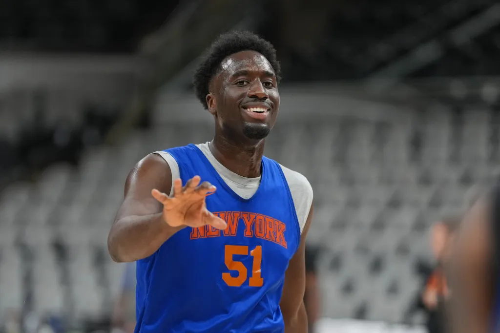 New York Knicks forward Mohamed Diawara (51) smiles during practice on media day for the 2026 NBA Finals at Frost Bank Center.