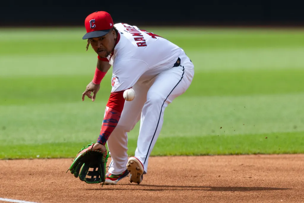 Cleveland Guardians third baseman José Ramírez (11) fields a ground ball against the Detroit Tigers for the third out of the first inning at Progressive Field.