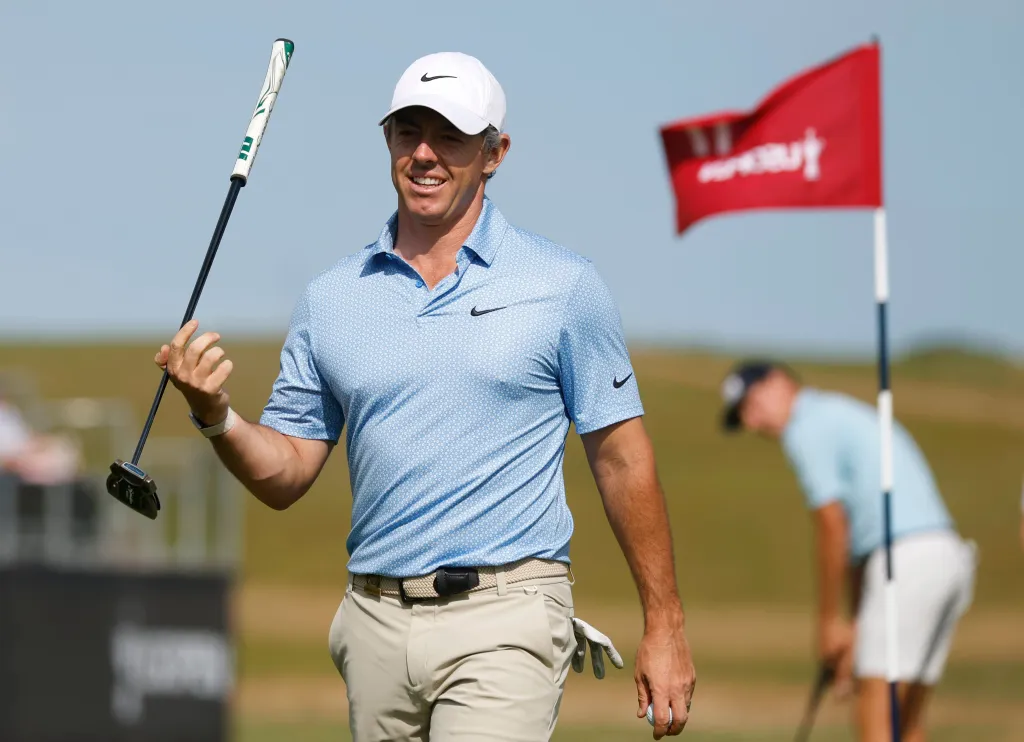 Rory McIlroy of Northern Ireland holds his putter while walking off of the 17th green while playing in a practice round on the eve of the 126th U.S. Open Golf Championship at Shinnecock Hills Golf Club on Wednesday, June 17, 2026 in Southampton, New York.