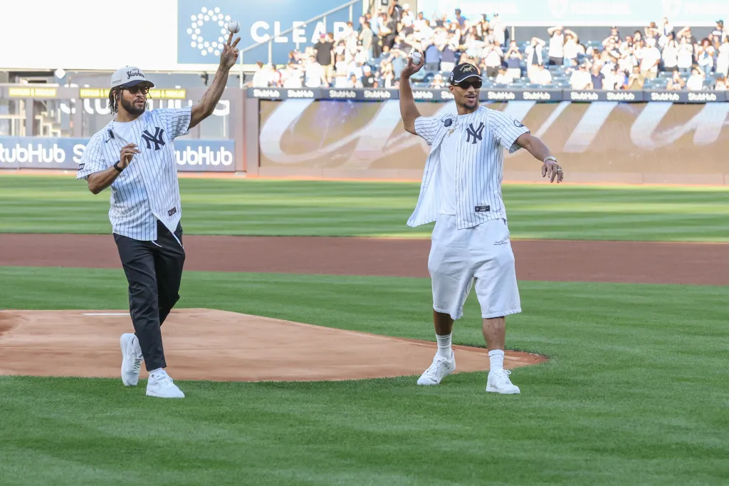 New York Knicks guards Jalen Brunson and Josh Hart throw out the first pitch prior to the game between the Chicago White Sox and the New York Yankees at Yankee Stadium. 