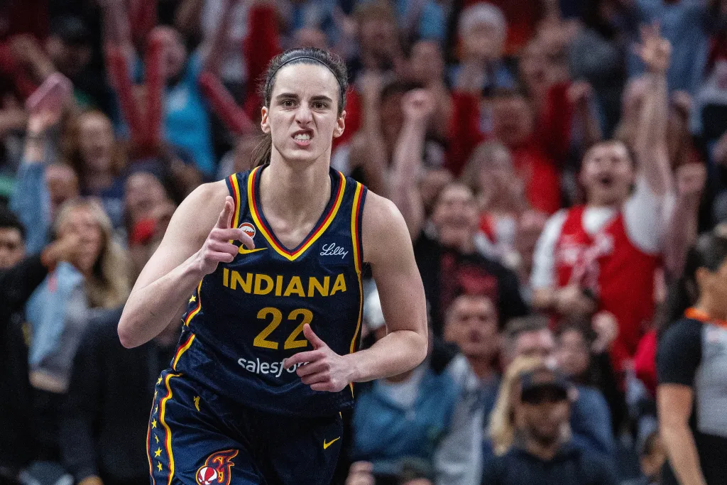 Jun 24, 2026; Indianapolis, Indiana, USA; Indiana Fever guard Caitlin Clark (22) celebrates a made shot in the first half against the Phoenix Mercury at Gainbridge Fieldhouse. 
