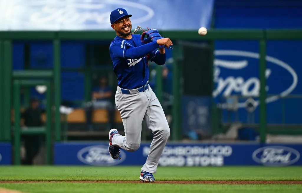 Mookie Betts #50 of the Los Angeles Dodgers throws to first base to force out Jake Mangum #28 of the Pittsburgh Pirates (not pictured) in the fifth inning during the game at PNC Park on June 11, 2026 in Pittsburgh, Pennsylvania.
