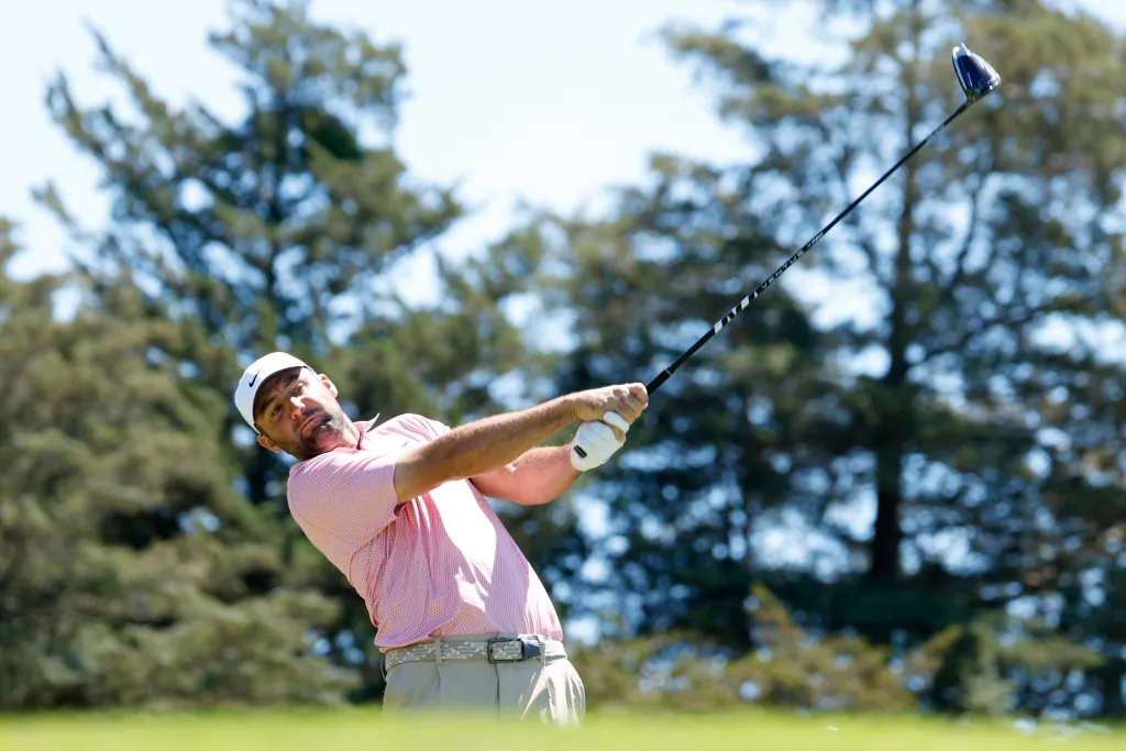 Scottie Scheffler of the United States plays his shot from the sixth tee during a practice round prior to the 126th U.S. OPEN at Shinnecock Hills Golf Club on June 16, 2026 in Southampton, New York.