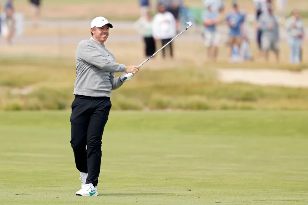 Rory McIlroy of Northern Ireland reacts to a shot on the eighth hole during the first round of the 126th U.S. OPEN at Shinnecock Hills Golf Club on June 18, 2026 in Southampton, New York. 