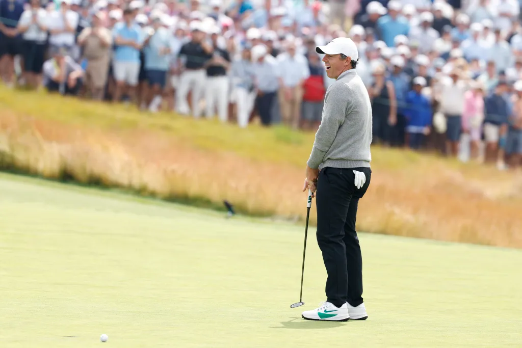 Rory McIlroy of Northern Ireland reacts after missing a putt on the ninth green during the first round of the 126th U.S. OPEN at Shinnecock Hills Golf Club on June 18, 2026 in Southampton, New York. 