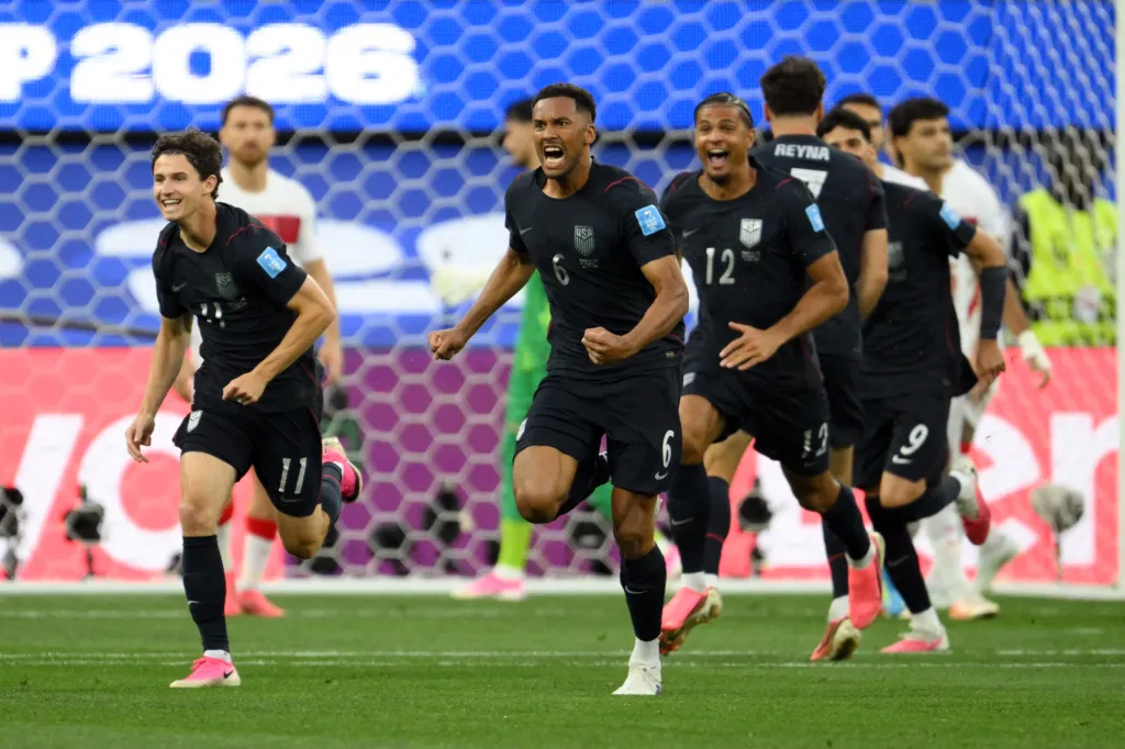 US defender #06 Auston Trusty (C) celebrates after scoring his team's first goal during the 2026 World Cup Group D football match between Turkey and USA at the Los Angeles Stadium in Inglewood on June 25, 2026.