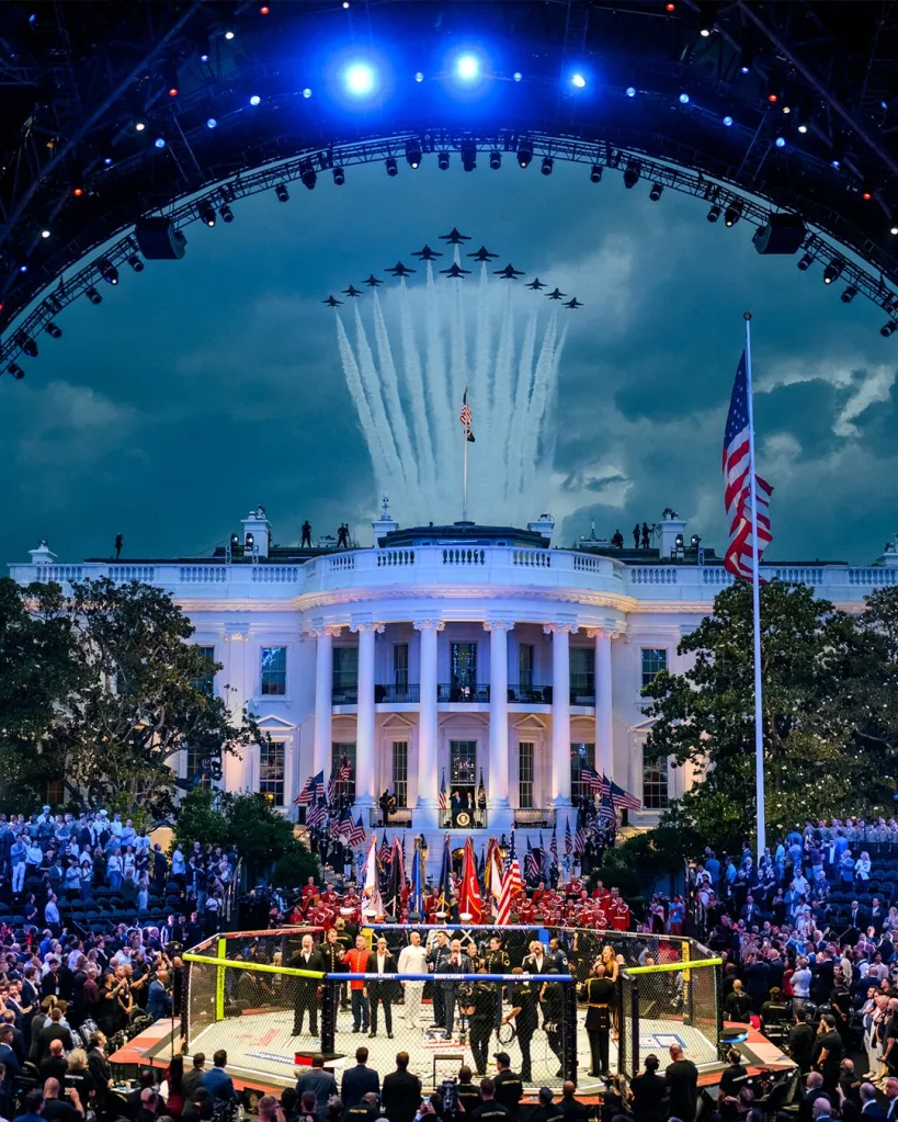 A large crowd watches an MMA fight in front of the White House as fighter jets fly overhead.