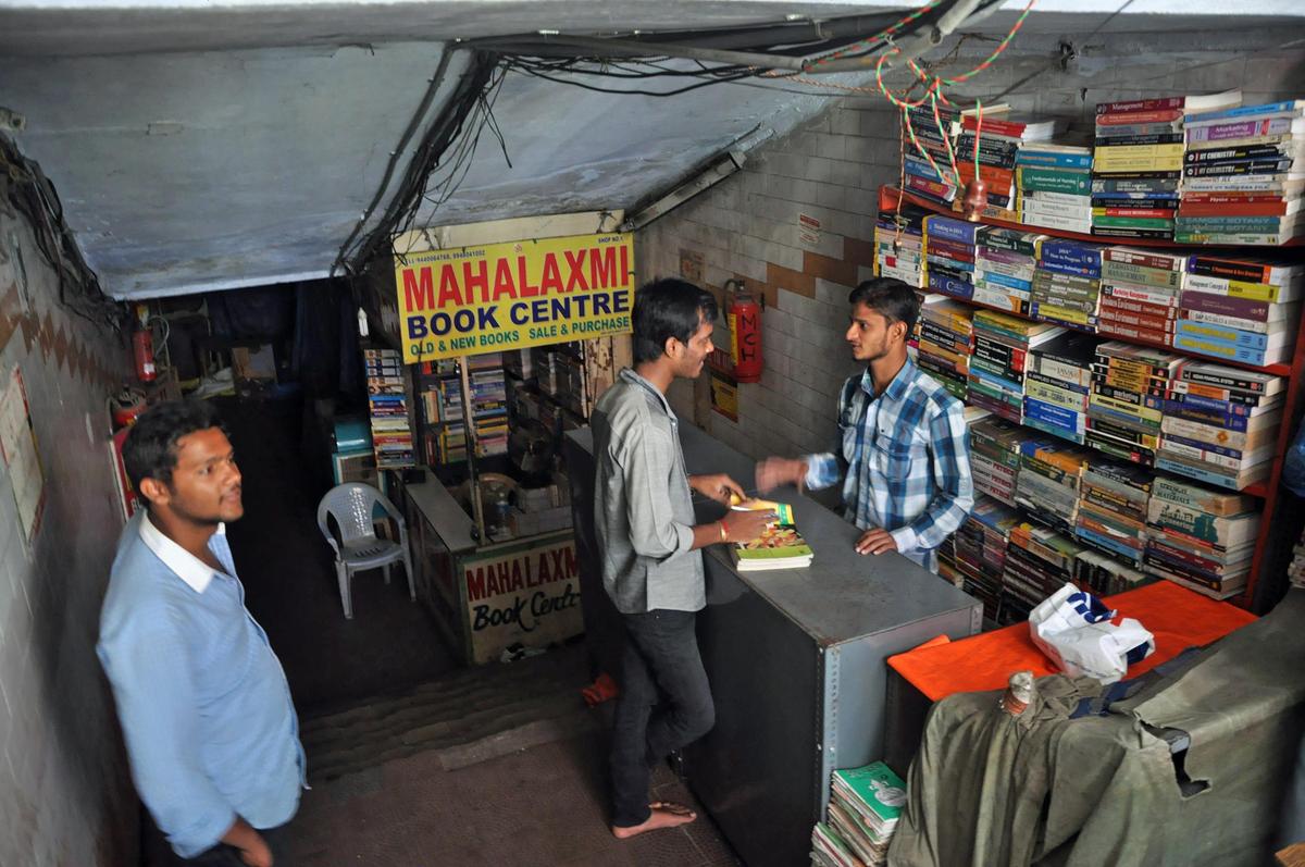 The book stores whcih were located by the side of a road in Koti, Hyderabad, were shifted to a subway in the locality. File