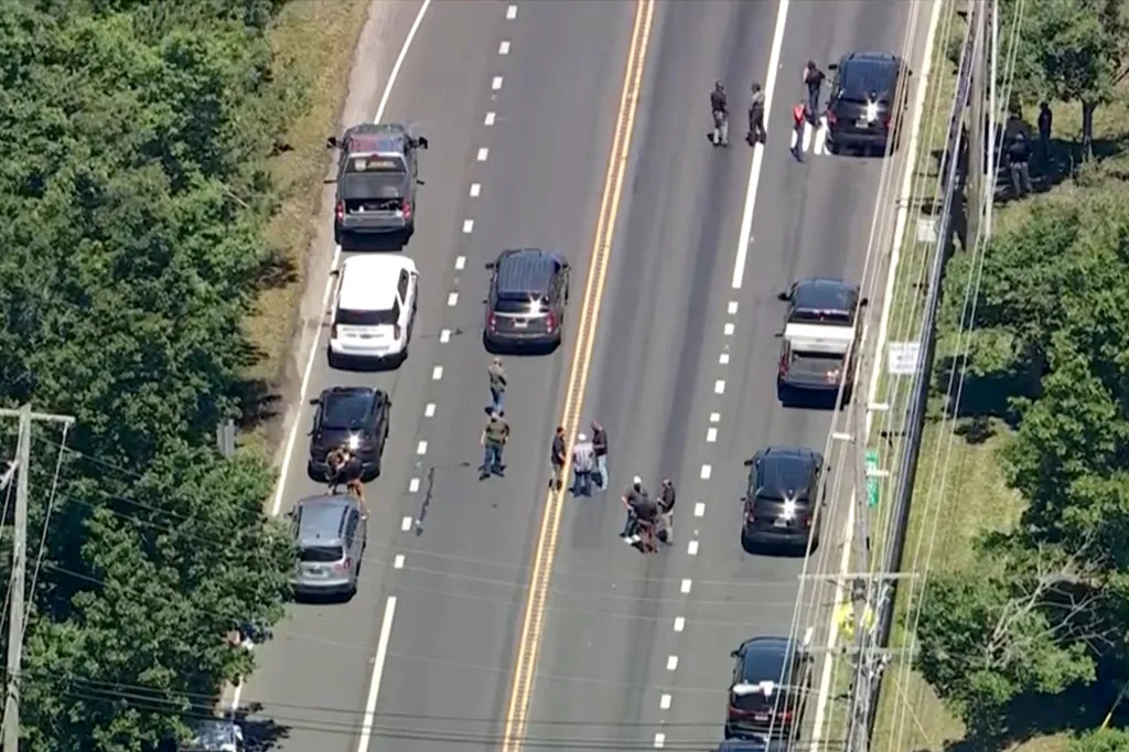 Aerial view of vehicles and people scattered across Route 72 in Stafford Township, New Jersey.