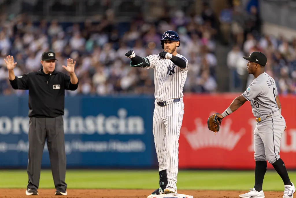 New York Yankees left fielder Cody Bellinger on base, reacting after hitting a double.