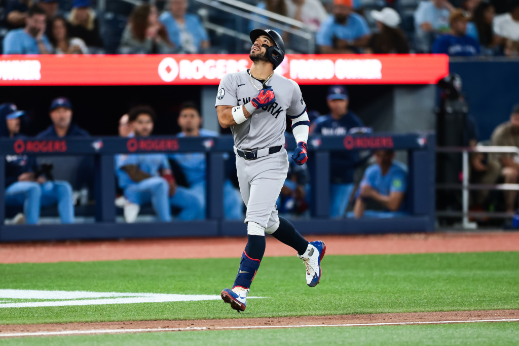 José Caballero rounding the bases after hitting a three-run home run.