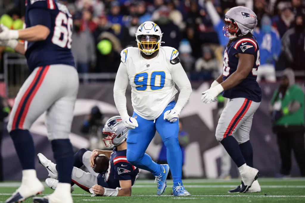 Teair Tart of the Los Angeles Chargers reacts on the field during an AFC wild card playoff football game against the New England Patriots.