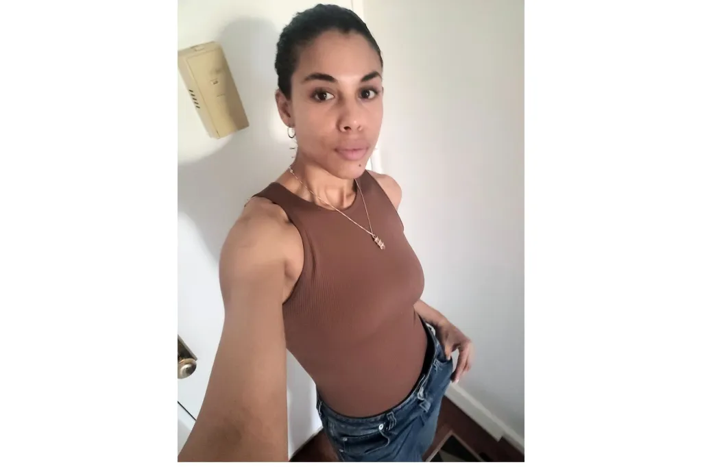 A woman in a bodysuit.