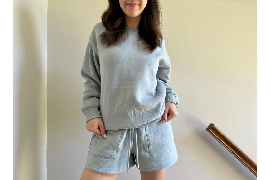 A woman in a lounge set.