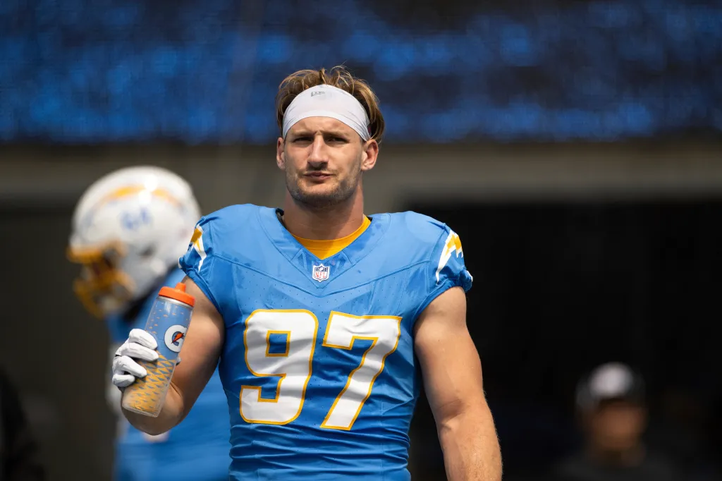 Los Angeles Chargers linebacker Joey Bosa drinks water before an NFL football game against the Las Vegas Raiders, Sept. 8, 2024, in Inglewood, Calif.