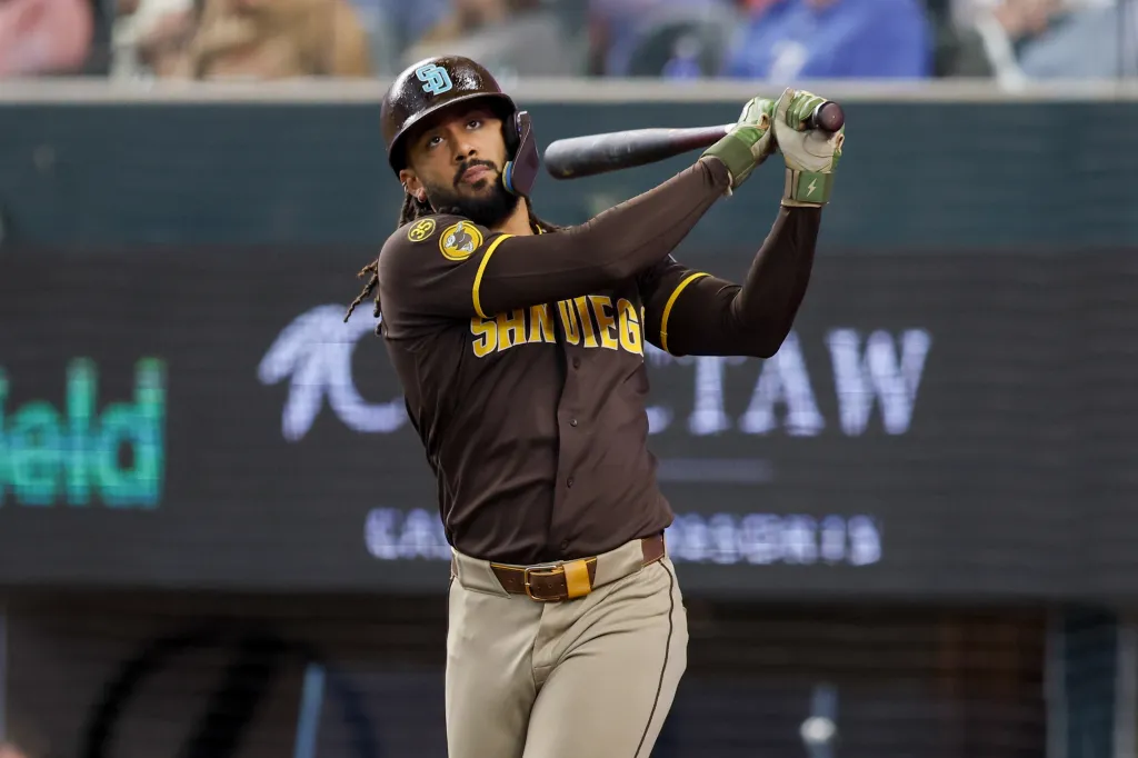 Fernando Tatis Jr. batting at a baseball game.